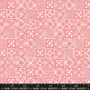May include: A repeating pattern of pink and cream-colored squares. Each square contains a different geometric design, including circles, crosses, and squares. The pattern is printed on fabric. The text "RUBY STAR SOCIETY" is printed at the bottom.