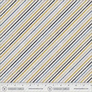 May include: Fabric with a diagonal stripe pattern in shades of yellow, blue, black, and gray on a cream background. The fabric has a textured appearance and a ruler along the bottom edge.