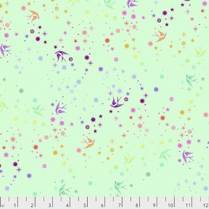 May include: A light green fabric with a repeating pattern of colorful birds and stars. The birds are flying in different directions and the stars are scattered throughout the fabric.
