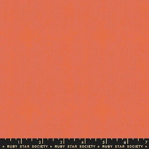 May include: Solid coral orange fabric with a subtle texture. The fabric is marked with a ruler and the text "RUBY STAR SOCIETY".
