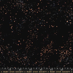 May include: Black fabric with a scattered pattern of small, light brown and gray dots.