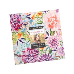 May include: A square fabric bundle with a floral design in shades of pink, purple, orange, and green. The fabric features a watercolor-style pattern of flowers and foliage. A label reads "SOULSTICE CREATE JOY PROJECT" and "moda FABRICS + SUPPLIES".