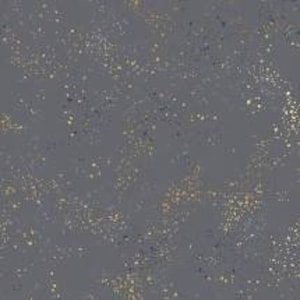 May include: A gray fabric with a scattered pattern of gold and silver glitter.