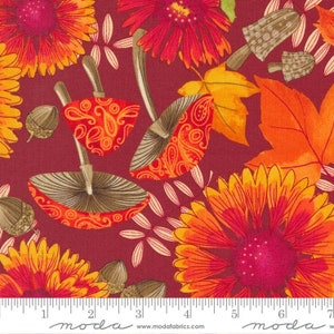May include: A red fabric with a repeating pattern of orange and yellow flowers, mushrooms, and leaves. The fabric has a paisley design and the text "moda" is printed on the bottom.