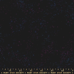 May include: Black fabric with a scattered pattern of small pink and blue dots. The fabric has a textured surface and a subtle sheen. The fabric is labeled "Ruby Star Society" in gold lettering.