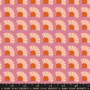 May include: A repeating pattern of pink and orange semi-circles with a white background. The semi-circles have a sunburst design.