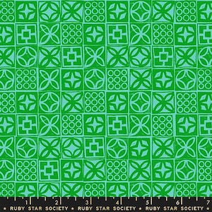 May include: A vibrant green and teal fabric with a repeating geometric pattern. The design features squares filled with various shapes, including circles, crosses, and floral motifs. The text "RUBY STAR SOCIETY" is printed at the bottom.