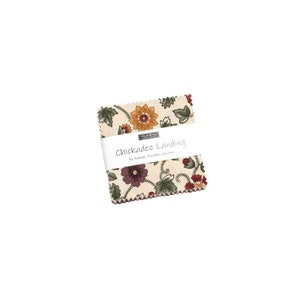 May include: A pack of fabric squares with a floral pattern in shades of red, yellow, green, and brown. The fabric is cream colored with a subtle texture. The pack is labeled "Chickadee Landing by Kansas Troubles Quilters".