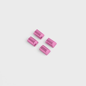 Zipper Cord Stops 1/2 inch Pink by Tula Pink and Jessica Sallie for Sallie Tomato STS176P