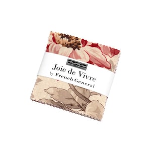 May include: A stack of fabric squares with a floral pattern in shades of red, pink, and beige. The fabric is wrapped with a white band that reads "Joie de Vivre by French General."
