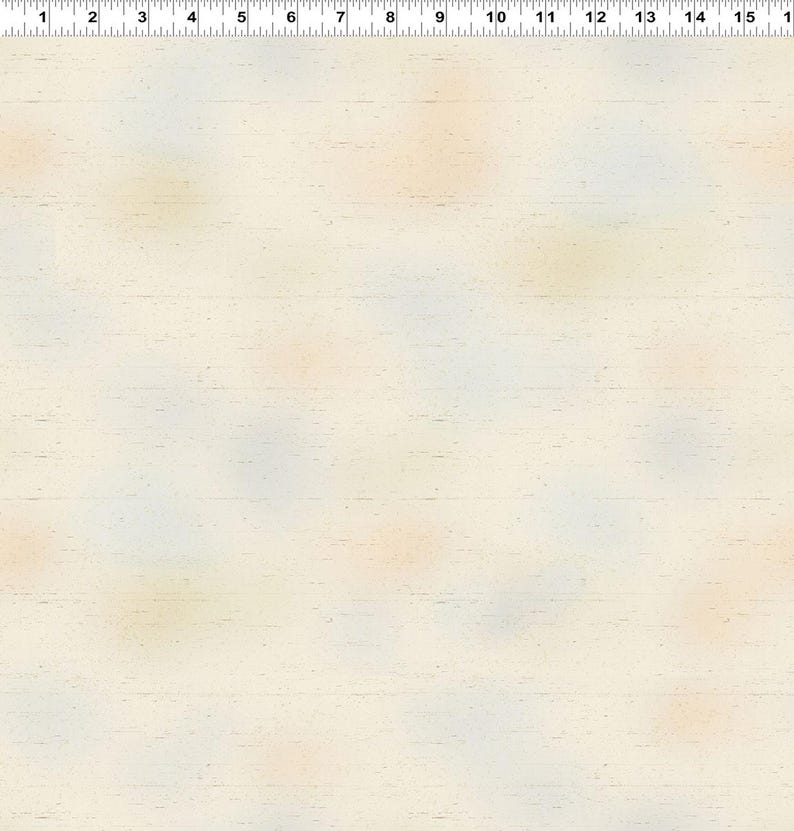 May include: Cream-colored fabric with a subtle wood grain texture and scattered pastel-colored spots. The fabric has a ruler printed along the top edge, with measurements in inches.