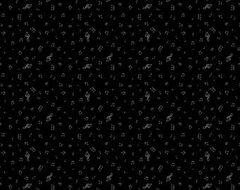 May include: Black fabric with a repeating pattern of musical notes and treble clefs in a light gray color. The fabric has a musical theme and is suitable for various craft projects. The text "Riley Blake Designs" is visible at the bottom.