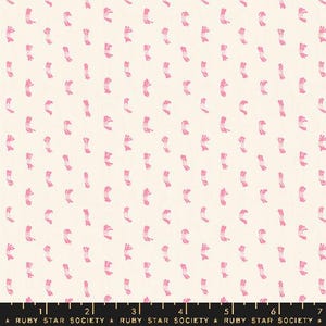 May include: White fabric with a repeating pattern of pink stylized brushstrokes. The fabric is marked with a ruler in inches and the text "RUBY STAR SOCIETY".