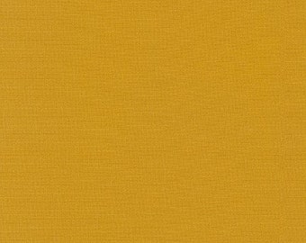 Kona Cotton Solid Curry Robert Kaufman K001-1677 Sold in HALF yard increments.