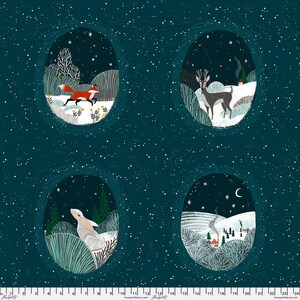 May include: A dark teal fabric featuring four oval vignettes of winter scenes with a fox, a deer, a rabbit, and a snowy village. A white ruler at the bottom shows the fabric width spans 24 inches, with FreeSpirit Fabrics branding printed.