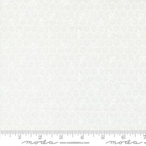 May include: Off-white fabric with a honeycomb pattern and subtle bee motifs. The design features a repeating hexagonal grid with delicate bee illustrations, creating a textured, light-colored surface. A ruler is at the bottom of the image, with measurements in inches.