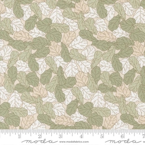 May include: Fabric with a repeating pattern of stylized leaves in shades of green, white, and beige. The leaves are layered on a light beige background. The fabric has a ruler along the bottom edge, with the brand name "moda" printed on the bottom.