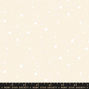 May include: Cream-colored fabric with a repeating pattern of white starbursts and dashes. The fabric has a soft, textured appearance, suitable for quilting or other craft projects. The text "RUBY STAR SOCIETY" is printed at the bottom.