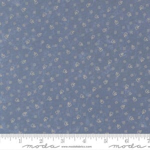 May include: Blue fabric with a repeating pattern of small, off-white geometric shapes and dots. The fabric has a slightly textured appearance and is suitable for quilting or other craft projects. The fabric is measured in inches.