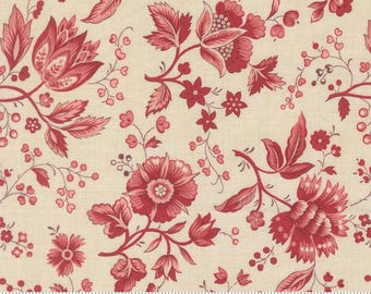 May include: Cream-colored fabric with a repeating pattern of red floral designs, including large flowers, leaves, and smaller blossoms. The fabric has a ruler along the bottom edge, marked in inches.