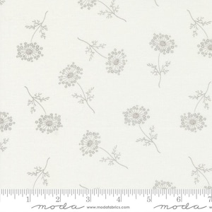 May include: White fabric with a repeating pattern of small gray flowers. The fabric has a subtle texture and is perfect for quilting, sewing, and crafting.