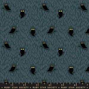 May include: A teal blue fabric with a repeating pattern of black owls with yellow eyes perched on branches. The owls are set against a background of small, white, brushstroke-like markings.