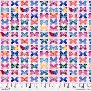 May include: A fabric with a repeating pattern of colorful butterflies in shades of blue, pink, yellow, and green. The butterflies are arranged on a light pink background with small white dots. The fabric has a measurement scale along the bottom.