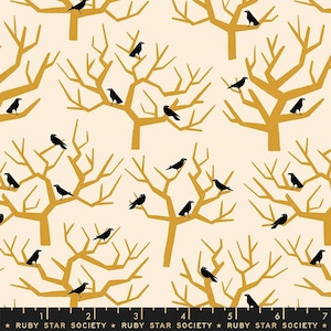May include: A white fabric with a repeating pattern of black crows perched on bare branches. The branches are a mustard yellow color.