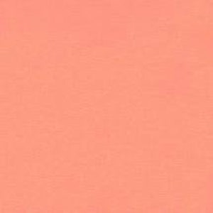May include: Solid peach-colored fabric. The material appears to be a woven textile, possibly cotton or a similar fiber. The color is a warm, light shade of orange-pink.