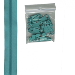 May include: A teal zipper with a zipper pull in a clear plastic bag. The zipper pull is also teal.