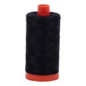 May include: A spool of black thread with an orange plastic bobbin.