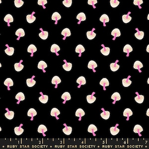 May include: Black fabric with a repeating pattern of white mushrooms with pink stems. The fabric has a ruler with markings in inches and the text "RUBY STAR SOCIETY" printed on it.