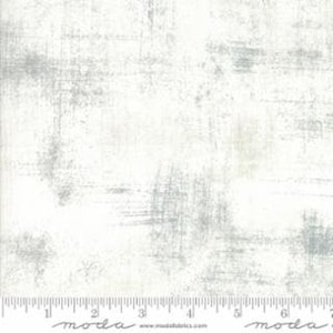 May include: White fabric with a subtle gray and beige distressed pattern. The fabric has a slightly textured surface.