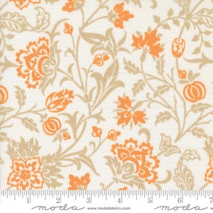 May include: Cream-colored fabric with a repeating floral pattern in orange and tan. The design features stylized flowers, buds, and leaves on a light background. The fabric has a ruler along the bottom with the word "moda" and the website address.
