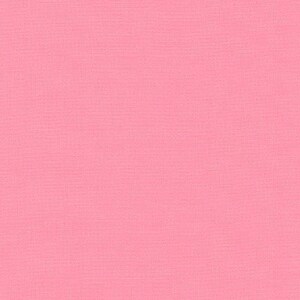 May include: A solid pink background.