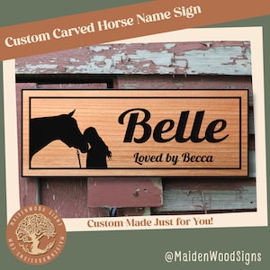 May include: Custom carved wooden sign with a silhouette of a horse and a person. The sign reads "Belle Loved by Becca".