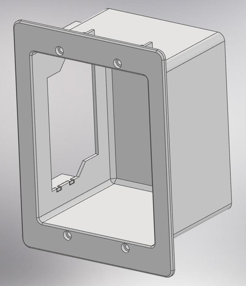 May include: A light gray electrical box with a rectangular faceplate. The faceplate has rounded corners and four screw holes. The box has an open interior and is designed to house electrical components. The overall design is simple and functional.