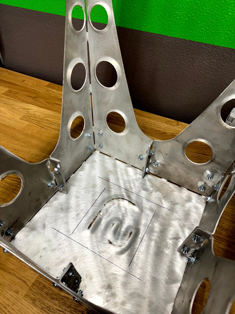 Bolt together assembly makes bomber shop stool easy to assemble with basic tools.