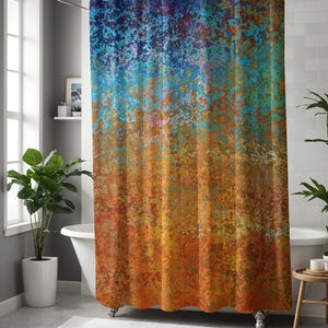 May include: Abstract shower curtain with a blue, orange and brown colour scheme. The curtain features a textured, distressed look.