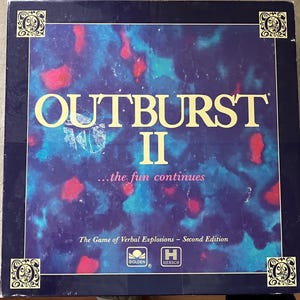 May include: A board game box for Outburst II, featuring a blue and purple background with red accents. The game title is in large, gold letters. The box also includes the text "...the fun continues" and "The Game of Verbal Explosions - Second Edition."