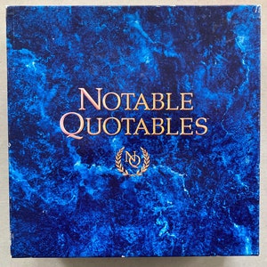 May include: A blue and gold box with the text "Notable Quotables" and a logo of a wreath with the letters "NQ" inside.
