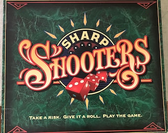 Juego de dados SHARP SHOOTERS de Milton Bradley, edición vintage de 1994.