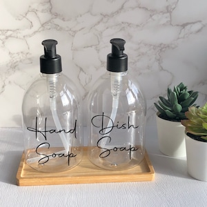 Clear Bell Bottle with Matte Black Pump |500ml Refillable Reusable Plastic Dispenser | Personalised With Any Word | With/Without Bamboo Tray
