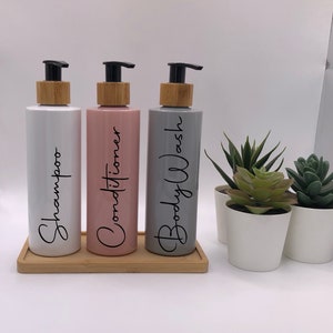 White,Pink & Grey Tubular Bottles With Black Bamboo Pumps | 250ml Refillable Reusable Plastic Bottle | Any Word | Bamboo Tray Set Of 3