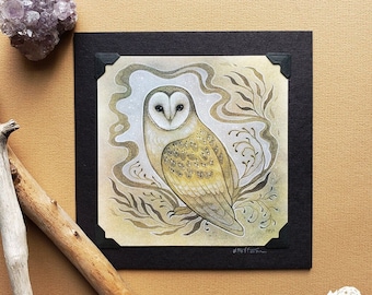 May include: A watercolor painting of a barn owl with a yellow and brown patterned body, perched on a branch with swirling smoke behind it.