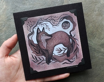 May include: A black and white illustration of a fox standing in a forest with a city skyline in the background. The illustration is framed in a black mat with a decorative border.