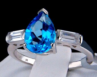 Swiss Blue Topaz Pear Solitaire with White Zircon Accents 10k Solid White Gold Ring