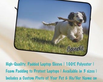 May include: A black laptop sleeve with a white border. The sleeve features a photo of a dog running through a grassy field with a stick in its mouth. The dog's name, "Bandit", is printed in black cursive on the sleeve. The sleeve is made of 100% polyester and has foam padding to protect laptops. It is available in three sizes.