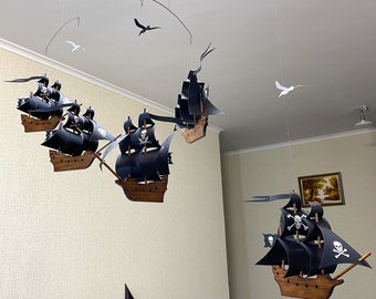 Pirate flotilla. 5 wooden pirate sailing ships with skulls and bones on the sails. An exclusive solution for your children's room.