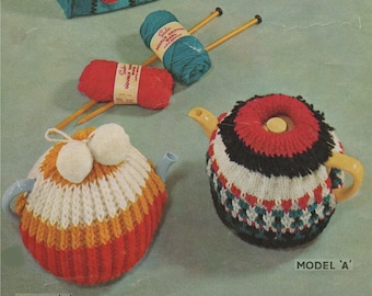 May include: A vintage knitting pattern booklet with instructions for making three different knitted items: a teal handbag with red flower accents, a white and orange teapot cozy, and a black, red, and white teapot cozy. The pattern is for Sirdar No. 1743 Double Knitting Wool or Double Crepe Wool.